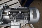 Used Vogelsang Universal Rotary Lobe Pump, Carbon Steel. Approximate 340 gallons per minute. Driven by a 5hp, 3/60/230/460 volt, 1725 rpm gear motor, ratio 5.79 to 1. Base mounted. Serial# 11-06408.