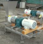 Used APV Rectangular Inlet Top Feed Rotary Positive Displacement Pump, model R6RH, 316 stainless steel. Approximate capacity 150 gallons per minute at 600 rpm. 67.2 cubic inch displacement per revolu...