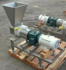 Used APV Rectangular Inlet Top Feed Rotary Positive Displacement Pump, model R6RH, 316 stainless steel. Approximate capacity 150 gallons per minute at 600 rpm. 67.2 cubic inch displacement per revolu...