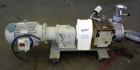 Used Fristam Horizontal Rotary Positive Displacement Pump, Model FKL250, 316 Stainless Steel. Approximate capacity 324 gallons per minute, (0.54) gallon displacement per revolution. 4'' Tri-clamp inl...