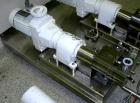 Used Flowtech Unibloc Rotary Positive Displacement Pump, Model 5000, Series 300, 316 Stainless Steel, Horizontal. Approximate 28 gallons per minute capacity. 1