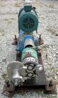 USED: Tri Clover rotary positive displacement pump, model PRR10-1-1/2M-TC1-4-ST-S, 316 stainless steel. Approximate 10 gallons per minute capacity, .013 gallon displacement per revolution. (2) 4 lobe...