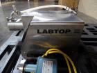Used Unibloc PD Labtop Rotary Lobe Pump, Model 250, Stainless Steel. Has polyflex plastic rotors, 1