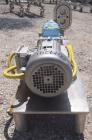 Used Waukesha Rotary Positive   Displacement  Pump, Model 006, 316 Stainless Steel. Approximately 6 gallons per minute at 200 psi at 800 rpm capacity, .0082 gallon displacement per revolution. 1 1/2