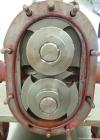 Used Waukesha Rotary Positive Displacement Pump, Model 006, 316 Stainless Steel. Approximately 6 gallons per minute at 200 psi at 800 rpm capacity, (.0082) gallon displacement per revolution. 1-1/2
