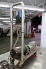 Used Waukesha Rotary Positive Displacement Pump, Model 006, 316 Stainless Steel. Approximately 6 gallons per minute at 200 psi at 800 rpm capacity, (.0082) gallon displacement per revolution. 1-1/2