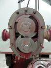Used Waukesha Rotary Positive Displacement Pump, Model 006, 316 Stainless Steel. Approximately 6 gallons per minute at 200 psi at 800 rpm capacity, (.0082) gallon displacement per revolution. 1-1/2