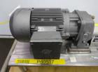 Used Waukesha Rotary Positive Displacement Pump, Model 006, 316 Stainless Steel. Approximately 6 gallons per minute at 200 psi at 800 rpm capacity, (.0082) gallon displacement per revolution. 1
