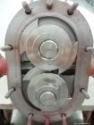 Used Waukesha Rotary Positive Displacement Pump, Model 015, 316 Stainless Steel. Approximately 10 gallons per minute at 100 psi at 600 rpm capacity, (.013) gallon displacement per revolution. 1-1/2” ...