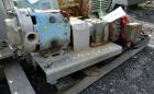 Used Waukesha Positive Displacement Pump, Model 015, 316 Stainless Steel. Approximate displacement 0.142 gallons per revolution, nominal capacity to 9 gallons per minute. Driven by a 2hp, 3/60/230/46...