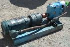 Used Waukesha Rotary Positive Displacement Pump, Model 030/U2, 316 Stainless Steel. Approximately 36 gallons per minute at 100 psi at 600 rpm capacity, (.06) gallon displacement per revolution. 1-1/2...