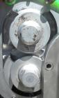 Used Waukesha Rotary Positive Displacement Pump, Model 030/U2, 316 Stainless Steel. Approximately 36 gallons per minute at 100 psi at 600 rpm capacity, (.06) gallon displacement per revolution. 1-1/2...