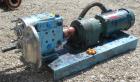 Used Waukesha Rotary Positive Displacement Pump, Model 030U2-AP, 316 Stainless Steel. Approximately 36 gallons per minute at 100 psi at 600 rpm capacity, .06 gallon displacement per revolution. 1-1/2...