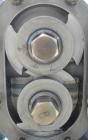 Used Waukesha Rotary Positive Displacement Pump, Model 030U2-AP, 316 Stainless Steel. Approximately 36 gallons per minute at 100 psi at 600 rpm capacity, .06 gallon displacement per revolution. 1-1/2...