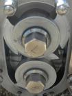 Used Waukesha Rotary Positive Displacement Pump, Model 030U2-AP, 316 Stainless Steel. Approximately 36 gallons per minute at 100 psi at 600 rpm capacity, .06 gallon displacement per revolution. 1-1/2...