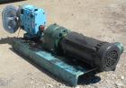 Used Waukesha Rotary Positive Displacement Pump, Model 030U2AP, 316 Stainless Steel. Approximately 36 gallons per minute at 100 psi at 600 rpm capacity, .06 gallon displacement per revolution. 1-1/2
