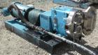 Used Waukesha Rotary Positive Displacement Pump, Model 030U2AP, 316 Stainless Steel. Approximately 36 gallons per minute at 100 psi at 600 rpm capacity, .06 gallon displacement per revolution. 1-1/2