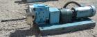 Used Waukesha Rotary Positive Displacement Pump, Model 030U2AP, 316 Stainless Steel. Approximately 36 gallons per minute at 100 psi at 600 rpm capacity, .06 gallon displacement per revolution. 1-1/2