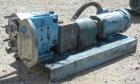 Used Waukesha Rotary Positive Displacement Pump, Model 030U2AP, 316 Stainless Steel. Approximately 36 gallons per minute at 100 psi at 600 rpm capacity, .06 gallon displacement per revolution. 1-1/2