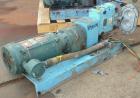 Used Waukesha Rotary Positive Displacement Pump, Model 030U2AP, 316 Stainless Steel. Approximately 36 gallons per minute at 100 psi at 600 rpm capacity, .06 gallon displacement per revolution. 1-1/2