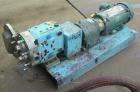 Used Waukesha Rotary Positive Displacement Pump, Model 030U2AP, 316 Stainless Steel. Approximately 36 gallons per minute at 100 psi at 600 rpm capacity, .06 gallon displacement per revolution. 1-1/2