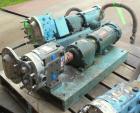 Used Waukesha Rotary Positive Displacement Pump, Model 030U2AP, 316 Stainless Steel. Approximately 36 gallons per minute at 100 psi at 600 rpm capacity, .06 gallon displacement per revolution. 1-1/2