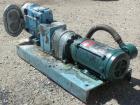 Used Waukesha Rotary Positive Displacement Pump, Model 030U2, 316 Stainless Steel. Approximately 36 gallons per minute at 100 psi at 600 rpm capacity, (.06) gallon displacement per revolution. 1-1/2