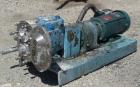 Used Waukesha Rotary Positive Displacement Pump, Model 030U2, 316 Stainless Steel. Approximately 36 gallons per minute at 100 psi at 600 rpm capacity, (.06) gallon displacement per revolution. 1-1/2
