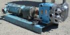 Used Waukesha Rotary Positive Displacement Pump, Model 030U2, 316 Stainless Steel. Approximately 36 gallons per minute at 100 psi at 600 rpm capacity, (.06) gallon displacement per revolution. 1-1/2