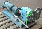 Used Waukesha Rotary Positive Displacement Pump, Model 030U2, 316 Stainless Steel. Approximately 36 gallons per minute at 100 psi at 600 rpm capacity, (.06) gallon displacement per revolution. 1-1/2