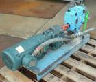 Used Waukesha Rotary Positive Displacement Pump, Model 030U2, 316 Stainless Steel. Approximately 36 gallons per minute at 100 psi at 600 rpm capacity, (.06) gallon displacement per revolution. 1-1/2