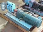 Used Waukesha Rotary Positive Displacement Pump, Model 030U2, 316 Stainless Steel. Approximately 36 gallons per minute at 100 psi at 600 rpm capacity, (.06) gallon displacement per revolution. 1-1/2
