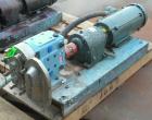 Used Waukesha Rotary Positive Displacement Pump, Model 030U2, 316 Stainless Steel. Approximately 36 gallons per minute at 100 psi at 600 rpm capacity, (.06) gallon displacement per revolution. 1-1/2