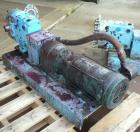 Used Waukesha Rotary Positive Displacement Pump, Model 030U2, 316 Stainless Steel. Approximately 36 gallons per minute at 100 psi at 600 rpm capacity, (.06) gallon displacement per revolution. 1-1/2