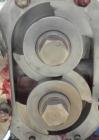 Used Waukesha Rotary Positive Displacement Pump, Model 030U2, 316 Stainless Steel. Approximately 36 gallons per minute at 100 psi at 600 rpm capacity, (.06) gallon displacement per revolution. 1-1/2