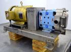 Used Waukesha Universal 2 Rotary Positive Displacement Pump, Model 030U2, 316 Stainless Steel. Approximate capacity 36 gallons per minute 200 psi at 600 rpm. (.060) Gallon displacement per revolution...