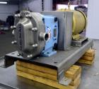 Used Waukesha Universal 2 Rotary Positive Displacement Pump, Model 030U2, 316 Stainless Steel. Approximate capacity 36 gallons per minute 200 psi at 600 rpm. (.060) Gallon displacement per revolution...