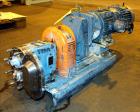 Used Waukesha Rotary Positive Displacement Pump, Model 030U2, 316 Stainless Steel. Approximately 36 gallons per minute at 250 psi maximum pressure at 600 rpm capacity, 0.060 gallon displacement per r...
