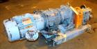 Used Waukesha Rotary Positive Displacement Pump, Model 030U2, 316 Stainless Steel. Approximately 36 gallons per minute at 250 psi maximum pressure at 600 rpm capacity, 0.060 gallon displacement per r...