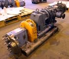 Used Waukesha Rotary Positive Displacement Pump, Model 030U2, 316 Stainless Steel. Approximately 36 gallons per minute at 250 psi maximum pressure at 600 rpm capacity, 0.060 gallon displacement per r...
