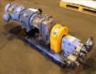 Used Waukesha Rotary Positive Displacement Pump, Model 030U2, 316 Stainless Steel. Approximately 36 gallons per minute at 250 psi maximum pressure at 600 rpm capacity, 0.060 gallon displacement per r...