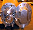 Used Waukesha Rotary Positive Displacement Pump, Model 030U2, 316 Stainless Steel. Approximately 36 gallons per minute at 250 psi maximum pressure at 600 rpm capacity, 0.060 gallon displacement per r...