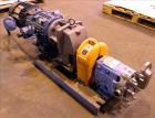 Used Waukesha Rotary Positive Displacement Pump, Model 030U2, 316 Stainless Steel. Approximately 36 gallons per minute at 250 psi maximum pressure at 600 rpm capacity, 0.060 gallon displacement per r...