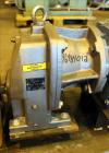 Used Waukesha Rotary Positive Displacement Pump, Model 030U2, 316 Stainless Steel. Approximately 36 gallons per minute at 250 psi maximum pressure at 600 rpm capacity, 0.060 gallon displacement per r...