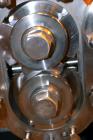 Used Waukesha Rotary Positive Displacement Pump, Model 030U2, 316 Stainless Steel. Approximately 36 gallons per minute at 250 psi maximum pressure at 600 rpm capacity, 0.060 gallon displacement per r...