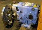 Used Waukesha Rotary Positive Displacement Pump, Model 030U2, 316 Stainless Steel. Approximately 36 gallons per minute at 250 psi maximum pressure at 600 rpm capacity, 0.060 gallon displacement per r...