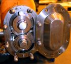 Used Waukesha Rotary Positive Displacement Pump, Model 030U2, 316 Stainless Steel. Approximately 36 gallons per minute at 250 psi maximum pressure at 600 rpm capacity, 0.060 gallon displacement per r...