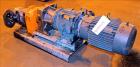Used Waukesha Rotary Positive Displacement Pump, Model 030U2AP, 316 Stainless Steel. Approximately 36 gallons per minute at 250 psi maximum pressure at 600 rpm capacity, 0.060 gallon displacement per...