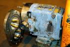 Used Waukesha Rotary Positive Displacement Pump, Model 030U2, 316 Stainless Steel. Approximately 36 gallons per minute at 250 psi maximum pressure at 600 rpm capacity, 0.060 gallon displacement per r...