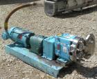 Used Waukesha Rotary Positive Displacement Pump, Model 030US-AP, 316 Stainless Steel. Approximately 36 gallons per minute at 100 psi at 600 rpm capacity, .06 gallon displacement per revolution. 1-1/2...